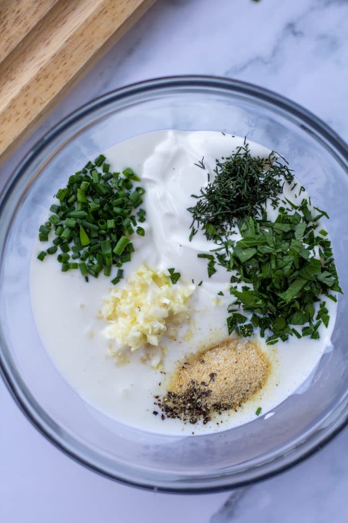 ranch dressing ingredients in a single bowl before being mixed