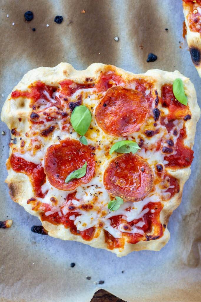 individual waffle iron pizza on a white background