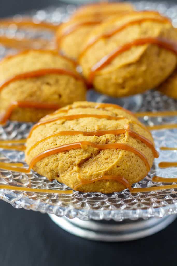 pumpkin cookies with caramel drizzled on top 