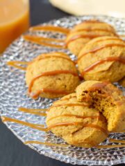 pumpkin cookies drizzled with caramel on a plate