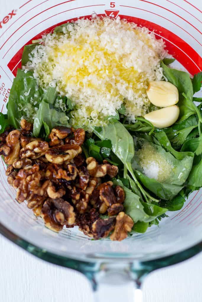 walnuts, cheese, garlic, basil, salt, olive oil in a bowl