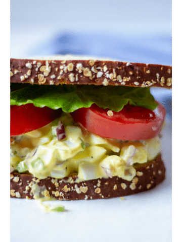 egg salad sandwich on a white background