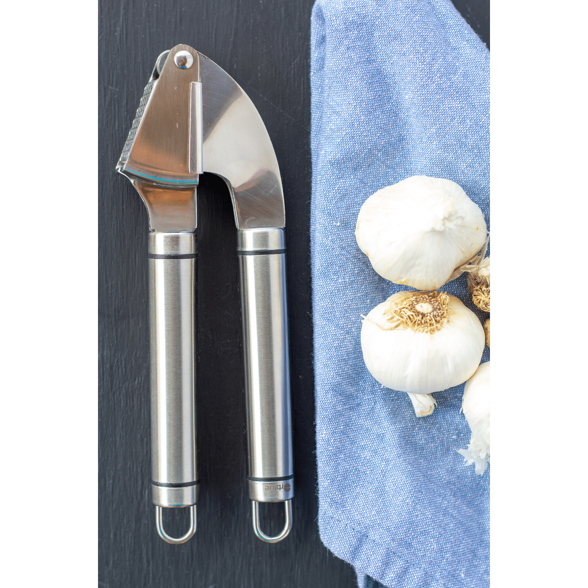 The 12 Absolute Best Uses For Your Garlic Press