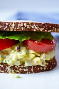 egg salad sandwich on a white background