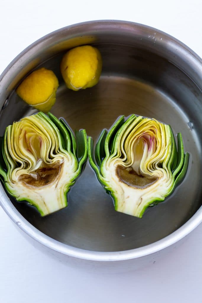 artichokes in a pot of water