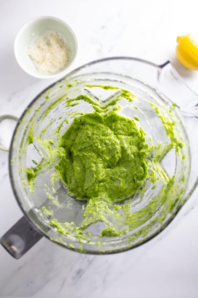 Green sauce in a blender with an overhead shot