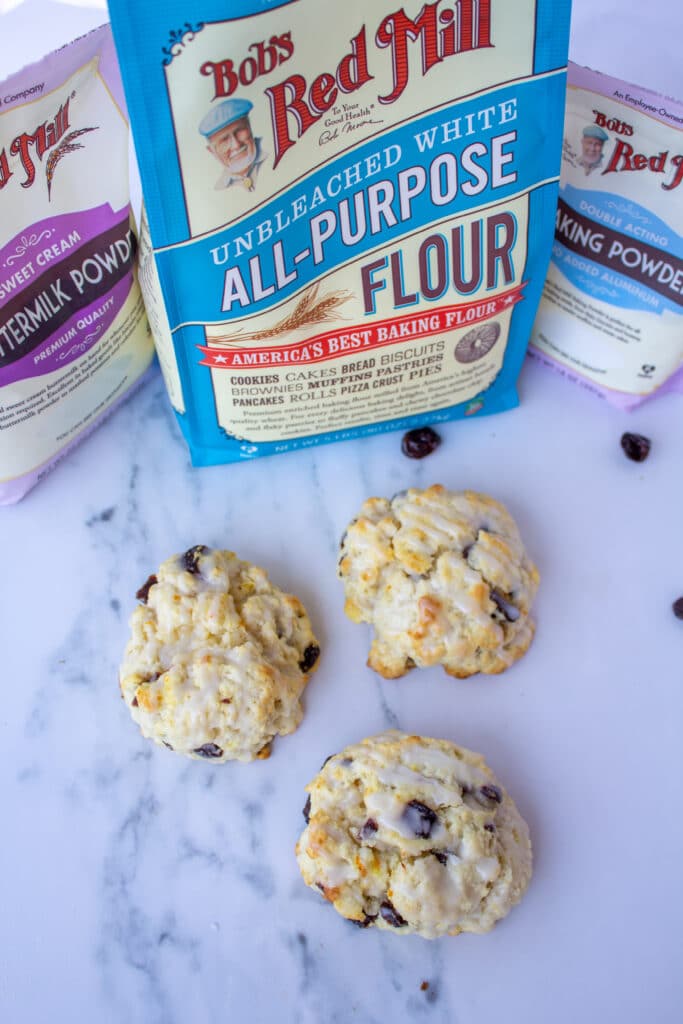 scones on a white background with bags of Bob's Red Mill flour in the background