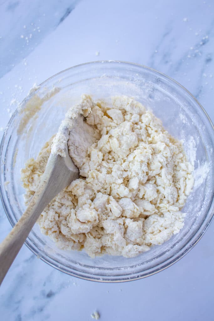 Flour, cream, and butter, cut in together in a glass bowl