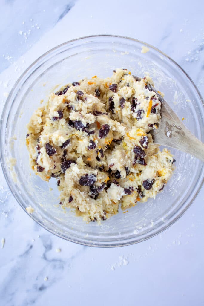the cherries and orange zest mixed in to the dough