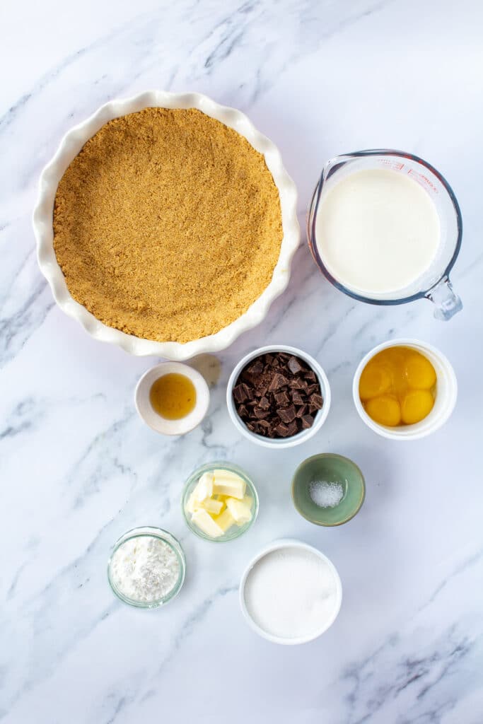 pie ingredients on a white marble background