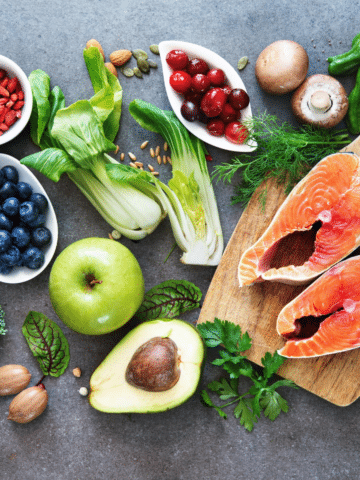 fruits and veggies on a slate gray background