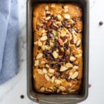 A loaf of bread in a pan on a white background