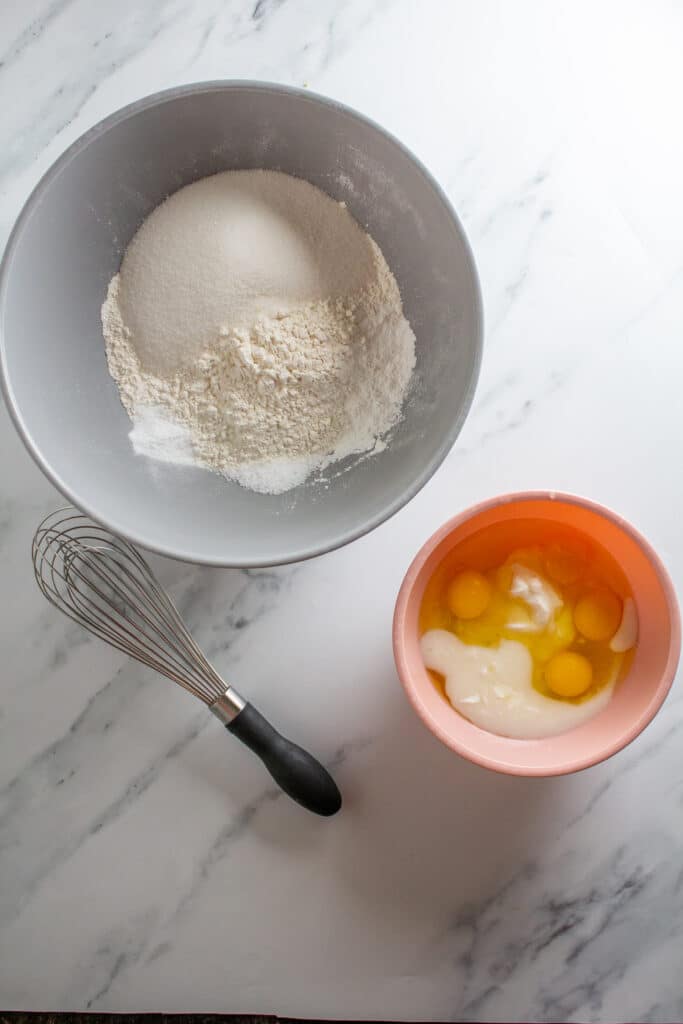 One bowl with wet ingredients and one bowl with dry ingredients