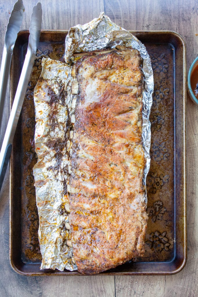 baked ribs on a baking sheet