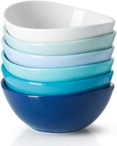 A stack of blue based bowls 