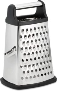 A silver box grater with a black and silver handle on top