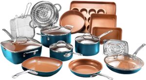 A large set of cook and bakeware arranged artfully 