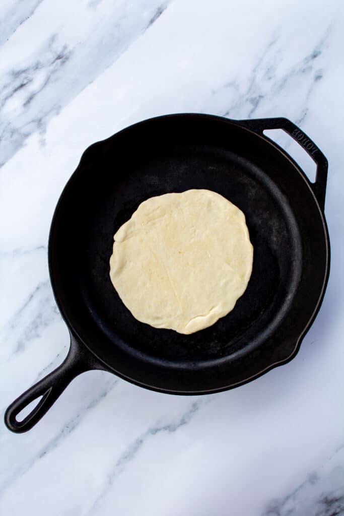 tortilla in a cast iron skillet