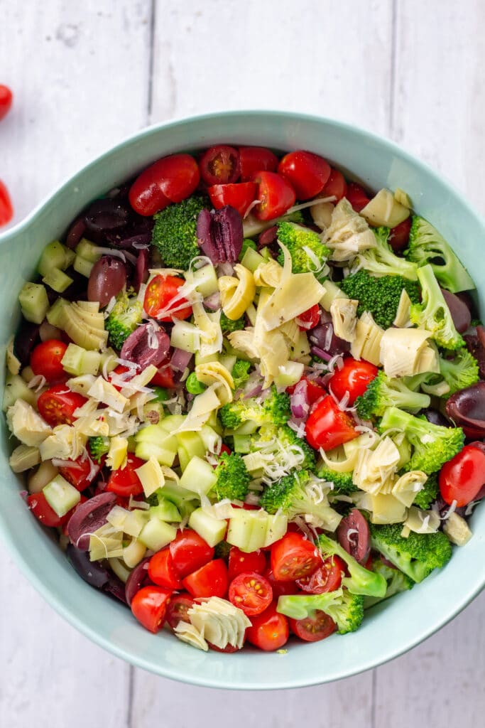 blue bowl of chopped veggies