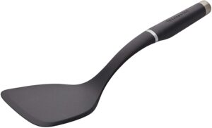 A wide, solid, black spatula 